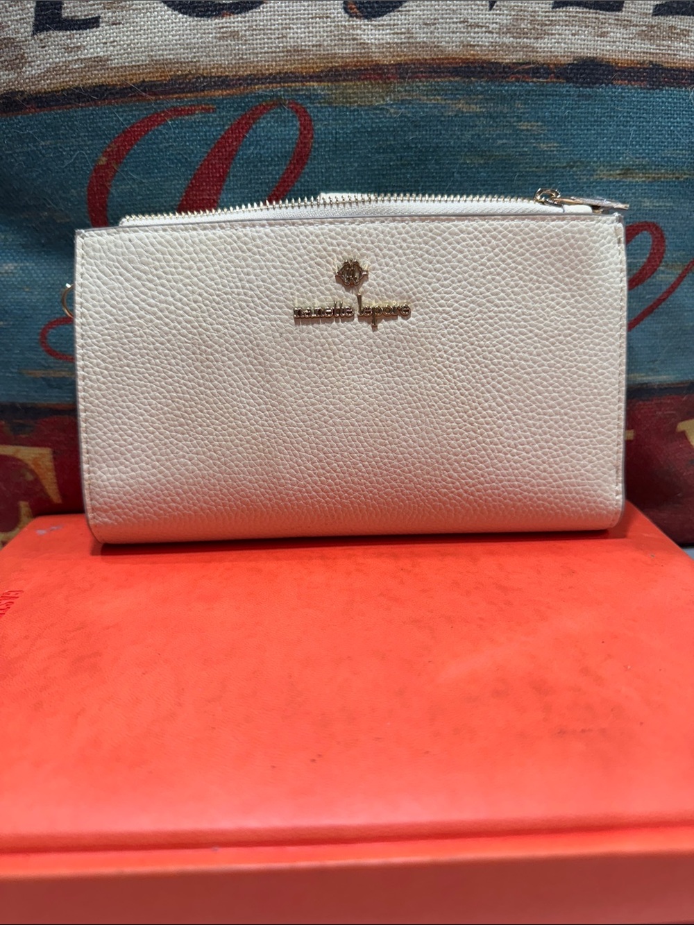 Nanette Lepore Pebbled Leather Wristlet - Ivory with Gold Logo